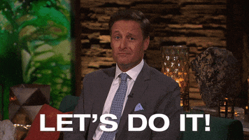 Reality TV gif. Chris Harrison on The Bachelorette looks at us, nodding his head towards us with a smug look on his face, as he says, “Let’s do it!”