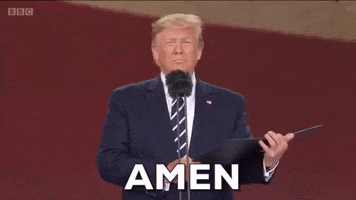 Political gif. Donald Trump stands at a microphone reading from a black folder with a flat expression. Text, "Amen."