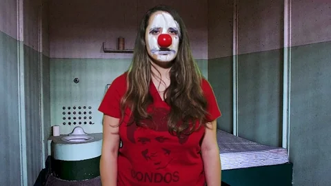 sad clown GIF