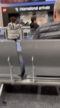 Dad and Daughter Share Long Embrace at Airport After Years Apart