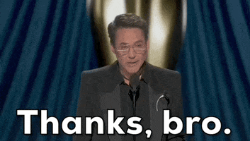 Oscars 2024 gif. Robert Downey Jr wins Best Supporting Actor. He quickly nods, raises his eyebrows and says with a deadpan expression, "Thanks, bro."