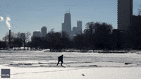 Ice Skaters Take Advantage of Frozen Pond on Sunny Chicago Sunday