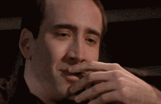 Image result for nic cage laugh gif