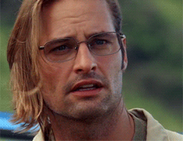 TV gif. Josh Holloway as Sawyer in Lost slowly slides off his glasses, eyes fixed and unmoving. 