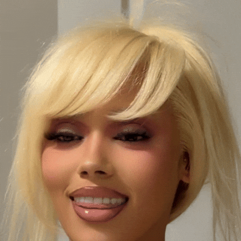 Lip Bite Smiling GIF by IndyWindy