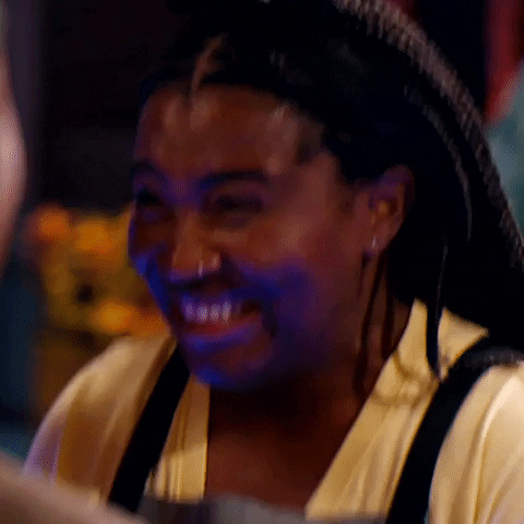 Reality TV gif. A contestant on Next Level Chef looks ecstatic as she squeals with pleasure and bounces up and down. 
