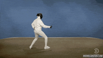 Sports gif. Fencer knocks their opponent's sword to the ground, then chases after them with sword drawn.