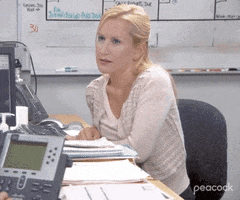 The Office gif. Angela Kinsey as Angela leans forward on her desk and speaks to someone with sincerity. Text, "If you pray hard enough you can turn yourself into a cat person."