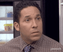 The Office gif. Zoom in on Oscar Nunez as Oscar Martinez. He has a shocked, almost worried expression on his face. He covers his mouth with his face. 