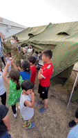 Evacuated Afghan Children Dance Along to 'Baby Shark' With Australian Soldiers