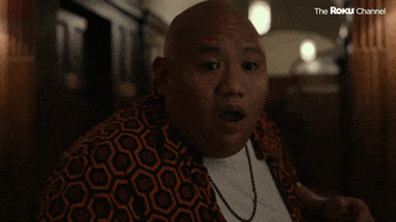 TV gif. Jacob Batalon
 Simon in 50 States of Fright. He's totally shocked and gasps as his jaw drops. He puts his arms in front of him, unsure what to do.