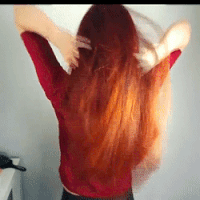 Playing Red Hair GIF