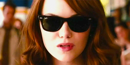 GIF of a woman looking cool