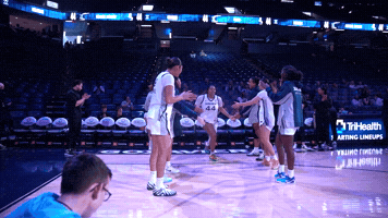 High Five Xavier University GIF by Xavier Women's Basketball