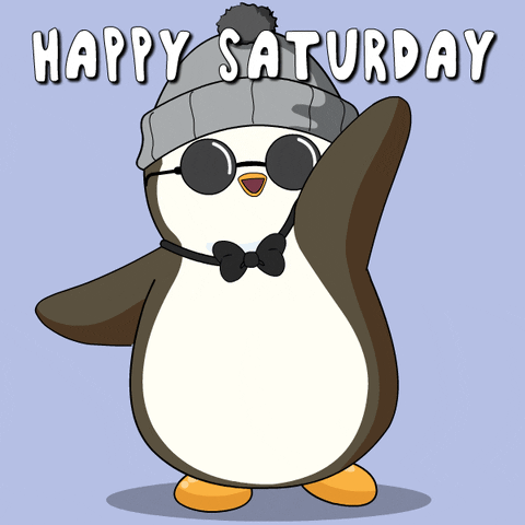 Cartoon gif. A gray penguin wearing a gray beanie, opaque sunglasses and a bowtie waves at us with its flipper while smiling widely. Text reads, "Happy Saturday." 