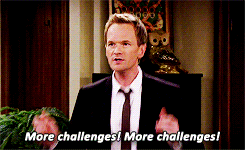 A white man in a suit jumps from the bottom and claps