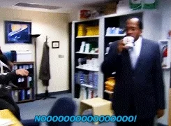 Dwight knocks coffee out of Stanley’s hand because of Jim’s faxes from the future prank
