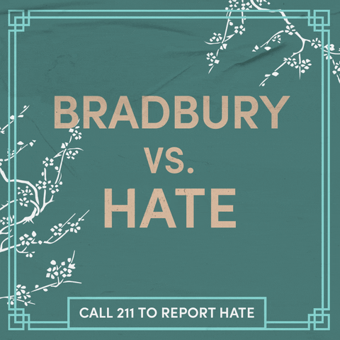 Text gif. Ecru letters on a sage green background, surrounded by swaying cherry blossom branches as a butterfly glides through. Text, "Bradbury vs hate, call 211 to report hate."