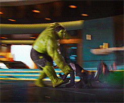 Disney gif. The Hulk is fighting Loki and the Hulk picks Loki up by one leg and smashes him from side to side, thrashing Loki's body with full force.