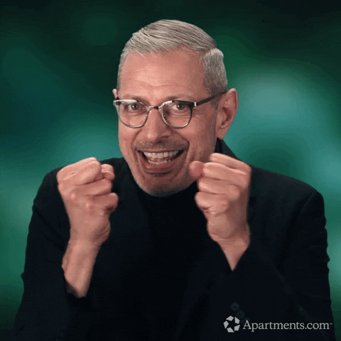 Ad gif. Jeff Goldblum in an ad for Apartments.com. He has his fists raised in front of his face and quivers with excitement, kind of looking like he needs to pee but is ecstatic about it. 