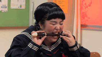 flute playing comedy GIF