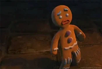 scared gingerbread man GIF