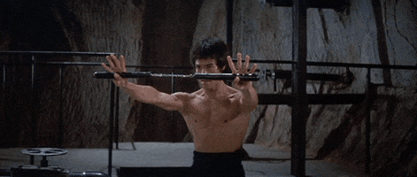 whipping bruce lee GIF