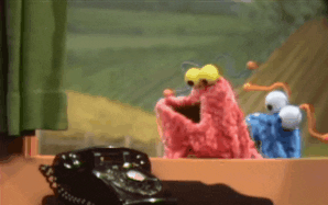 Sesame Street gif. A blue and a red muppet martian look down at a telephone and then back nervously away shaking their heads and saying “Nope. Nope. Nope.”