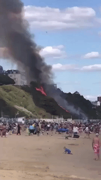 Fire Spreads Up Hill After Burning Beach Huts in Bournemouth