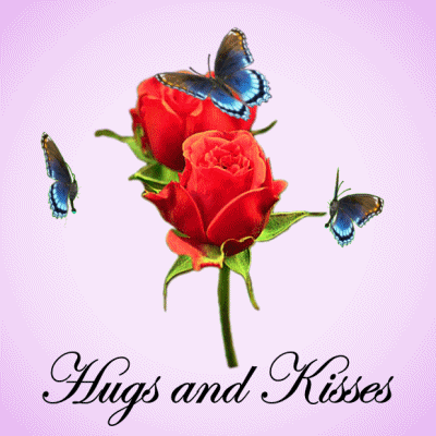 Digital art gif. Blue butterflies float around two red roses. Script, "Hugs and Kisses."