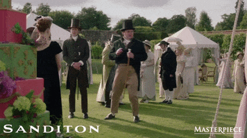 TV gif. Turlough Convery as Arthur Parker in Sandition wearing a Victorian-era outfit at a garden party holds a cane and scampers away and out of frame.