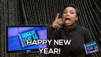 TV gif. From the set of New Year’s Rockin’ Eve, Singer Jennifer Hudson throws a hand in the air and yells, “Happy New Year!” before looking at us and shrugging.