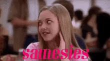 Movie gif. Amanda Seyfried Karen Smith of Mean Girls happily nods and says "Samesies."