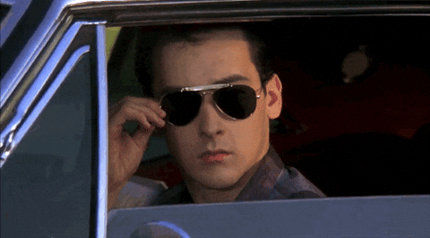john cusack wink GIF