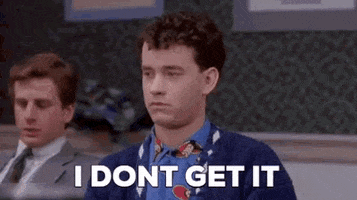 Movie gif. Tom Hanks as Josh from Big hesitantly raises his hand to timidly express confusion. Text, "I don't get it."