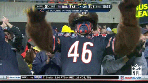 Animated GIF of the Chicago Bears mascot bear energetically running and waving a 'GO BEARS' flag, embodying persistent enthusiasm and forward momentum.