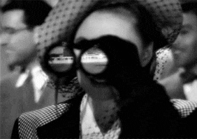 watching alfred hitchcock GIF