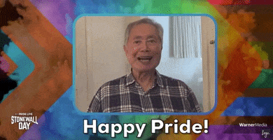 Celebrity gif. Video of George Takei saying "Happy Pride!" inset in a frame billowing with smoke overlaid with the progress pride flag. Logos in the corners: Stonewall Day and Warner Media.