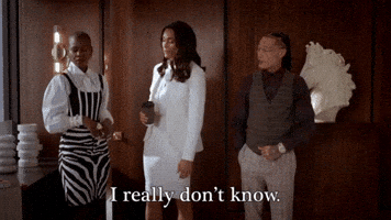 TV gif. A woman in a white suit from the show Sacrifice holds a coffee cup. She turns to a man in a vest and says frustratedly, "I really don't know." 