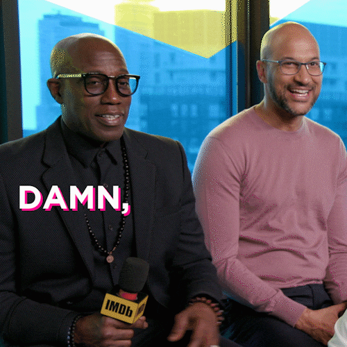 Celebrity gif. Keegan-Michael Key sitting next to Wesley Snipes being interviewed by IMDB. Wesley says "damn, damn, damn" and smiles.