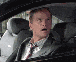 TV gif. Neil Patrick Harris as Barney in How I Met Your Mother turns with an amazed expression as he gives two thumbs up out of a car window.