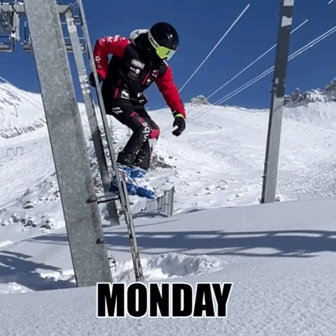 Sports gif. A snowboarder jumps from a ladder on a snow-covered mountainside. Their arms are spread wide as they disappear into powdery snow. Text, "Monday."