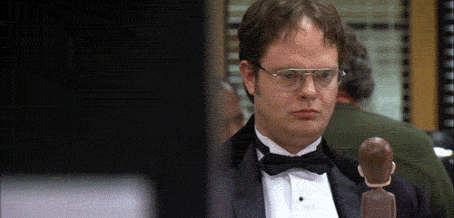 Dwight tries to do mind control on bobble head version of himself