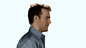 Celebrity gif. Standing in profile view, James Van Der Beek smacks his forehead and grimaces.