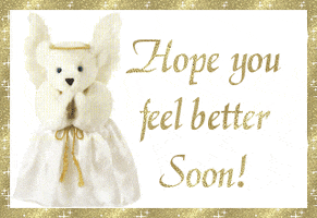 Text gif. A photo of a stuffed bear wearing an angel costume sits to the left of glittering gold text that reads, "Hope you feel better soon!" The whole gif is framed with a sparkling gold line. 