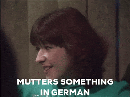 Mutters Something In German GIF