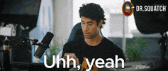 Video gif. A man looks down at something in his hand and nods in agreement. Text, "Uh, yeah."