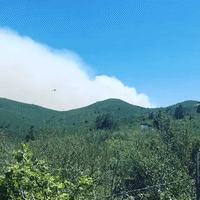 Plane Drops Retardant Onto Goodwin Fire