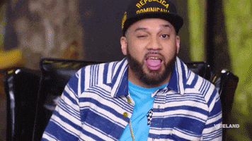 TV gif. Mero from Desus and Mero gives us a big wink and a shimmer appears at his eye.