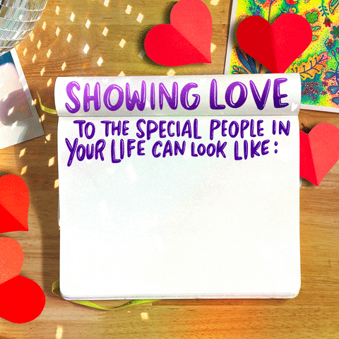 Text gif. Notebook folded open on a desk with art, photos, hearts, and a disco ball, displays hearts containing the message, "Showing love to the special people in your life can look like, checking in on them, helping people get the healthcare they need, advocating for their rights."